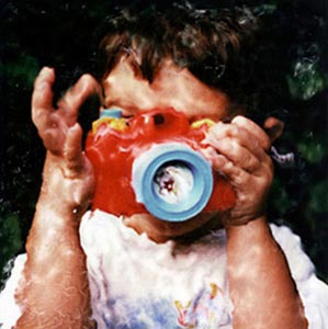 Polaroid painting of boy with camera
